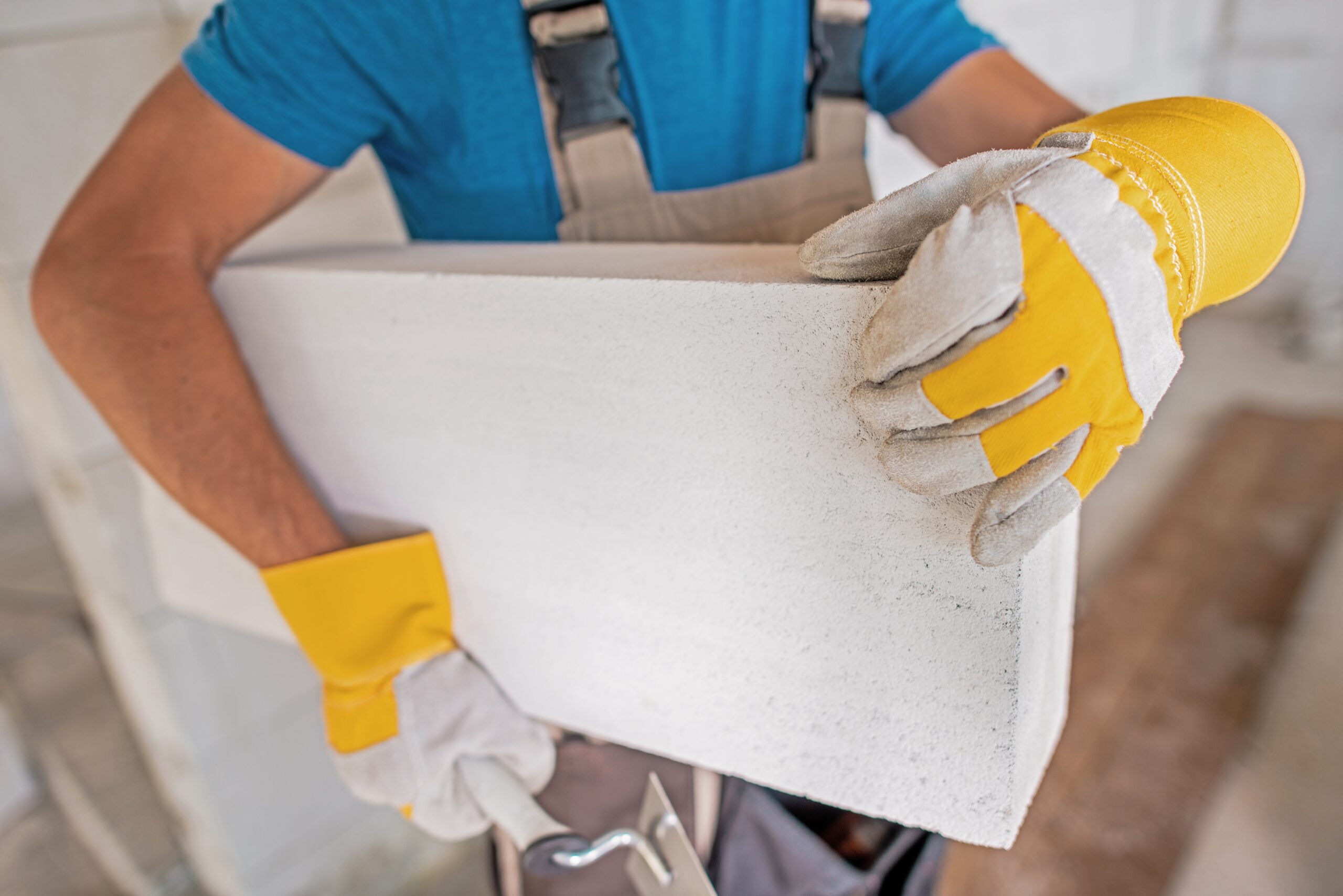 What equipment determines the crushing strength of concrete?